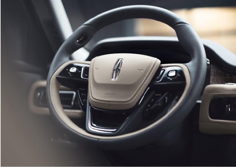 The intuitively placed controls of the steering wheel on a 2023 Lincoln Aviator® SUV | Irwin Lincoln in Freehold NJ