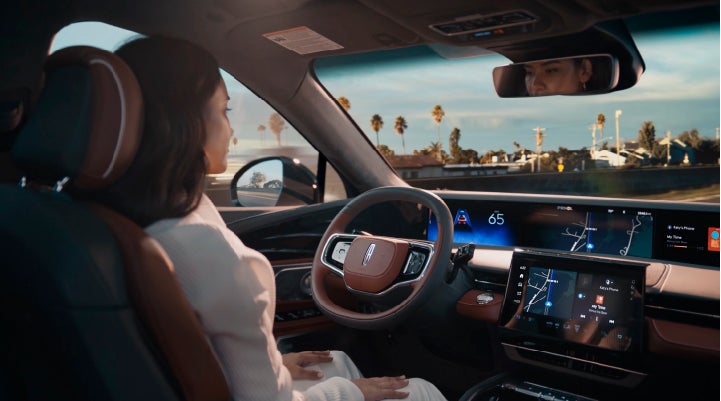 A person is shown driving hands-free on the highway with available Lincoln BlueCruise technology. | Irwin Lincoln in Freehold NJ